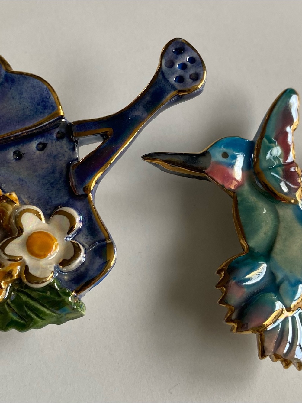 Hand-Painted Blue & Teal Ceramic Hummingbird Brooch and Watering Can Brooch Set